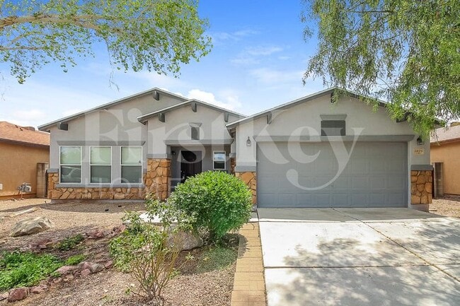 Building Photo - 5878 E Cedarbird Dr