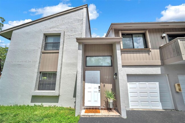 Building Photo - 10611 SW 113th Pl Unit 93-C