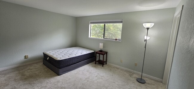 Full size bed is showing room size - 7621 46th Pl W House