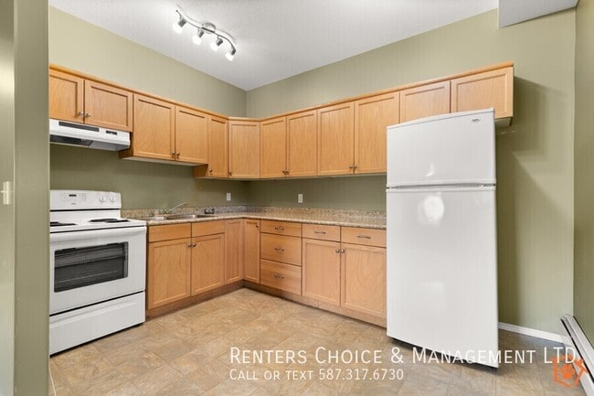 Photo - Main Floor 2 bedroom Unit With Onsite laundry, BONUS INCENTIVE