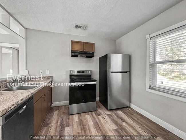 Photo - 4 Bed, 2 Bath Home with Off-Street Parking / Pet-Friendly / Available Now!