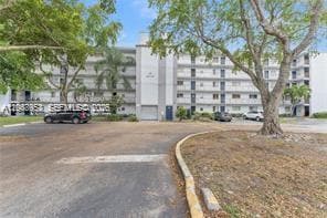 Building Photo - 8700 N Sherman Cir Unit 108
