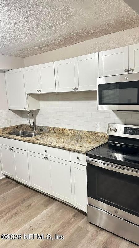 Photo - 1124 W 25th St Unit 3