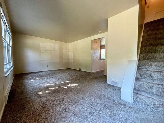 Photo - Lovely 2BR Townhome at Regency Place! Spacious Rooms -Attached Garage & Yard! Tour Today!