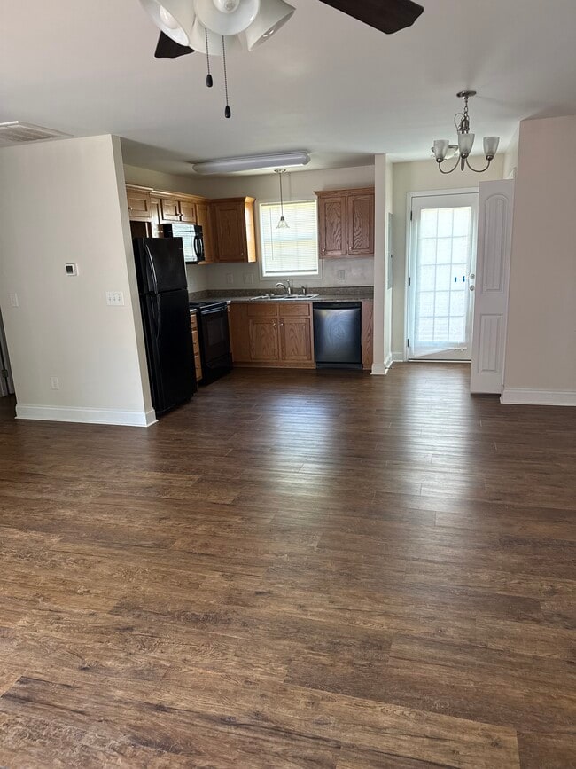 Open den and kitchen - 134 E 12th St Unit 134 East 12 st Newton NC