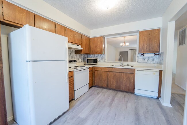 Photo - This darling 2 bedroom, 1.5 bath townhome is perfect for low maintenance, one level living! With ...