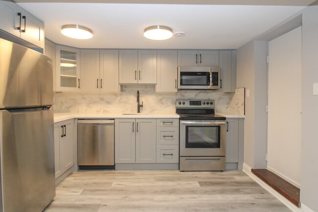 Photo - 2 Bedroom Basement Unit– All Utilities & Parking Included – $2,099/month Unité A