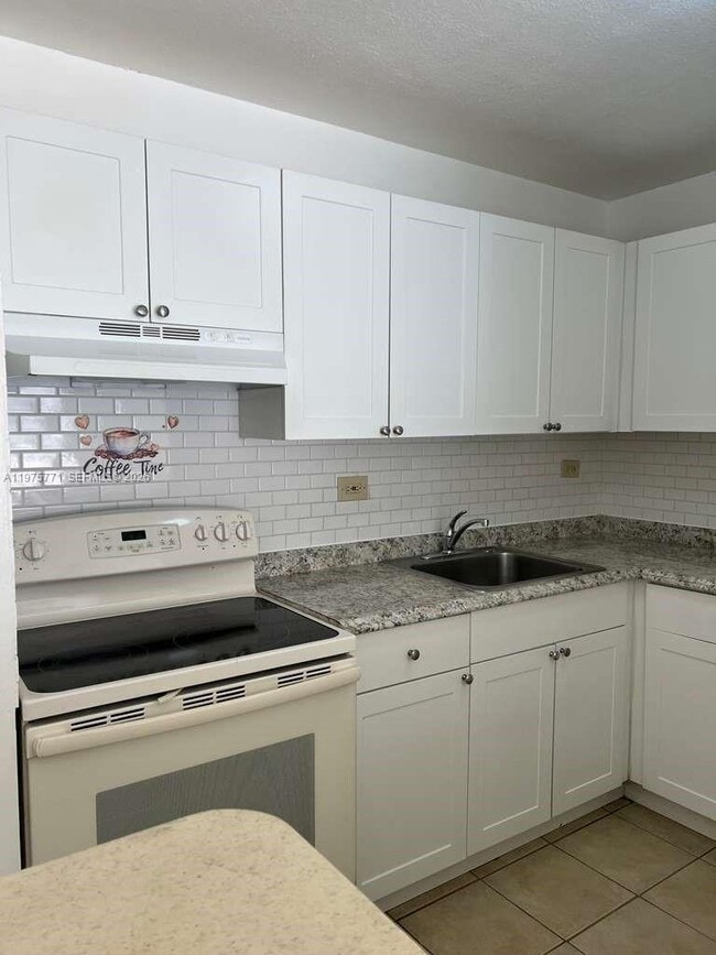 Building Photo - 7020 NW 179th St Unit 109