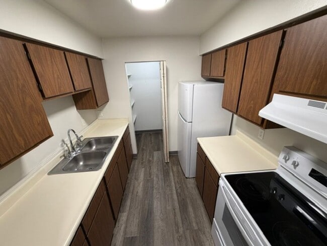 Photo - MOVE-IN Ready - 2 bedroom, One Bath - Top Floor with Private balcony and Central A/C! Unit 30