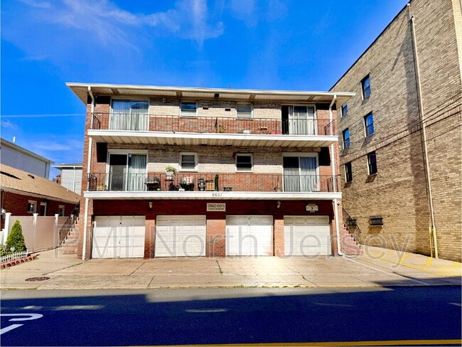 Building Photo - 9051 Palisade Ave Unit #8