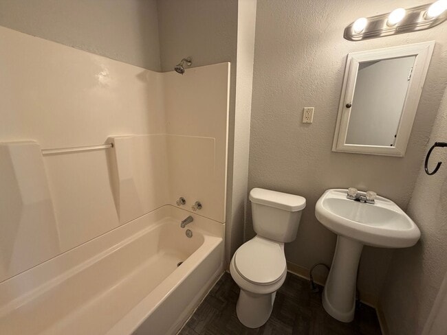 Photo - Charming 2-Bedroom Home with Secure Front Porch, Carport & Big Yard in Goodyear Heights