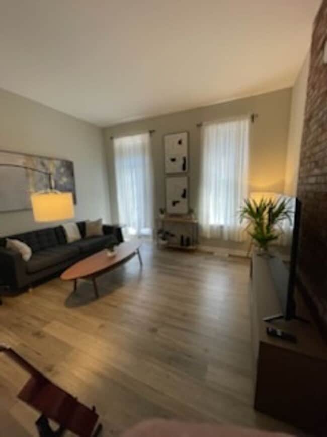 Building Photo - Menard Apartments Unit 2359 1
