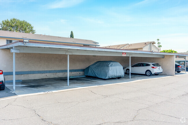 Covered car ports. - Beachside Apartments