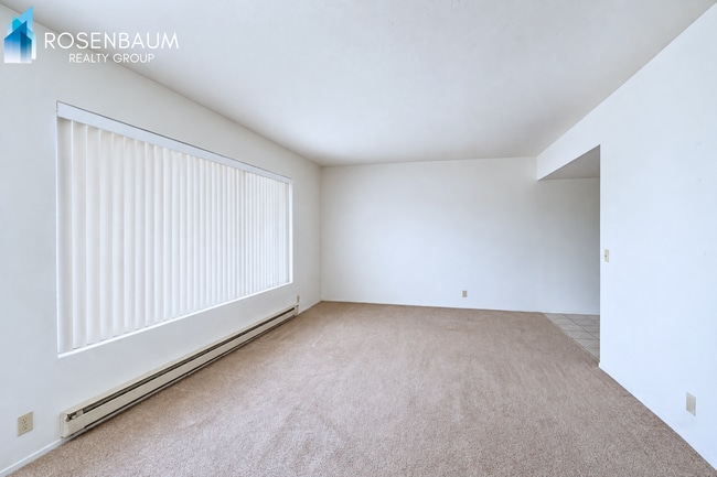 Building Photo - Cozy Upstairs 2-Bedroom Apartment with Shared Fenced Yard