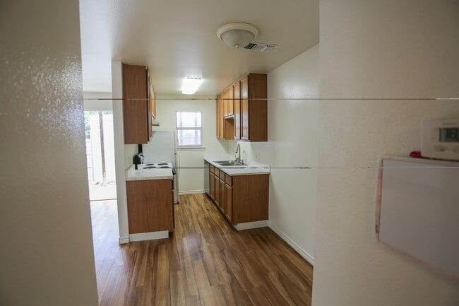 Apartment front entrance/kitchen - Forest West Apartments