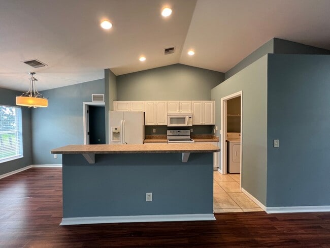 Photo - Charming 3-bedroom, 2-bath single-family home with a garage.