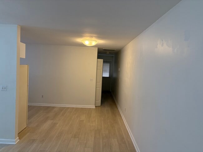 Hallway to kitchen - 553 Memorial Dr Ext Unit G