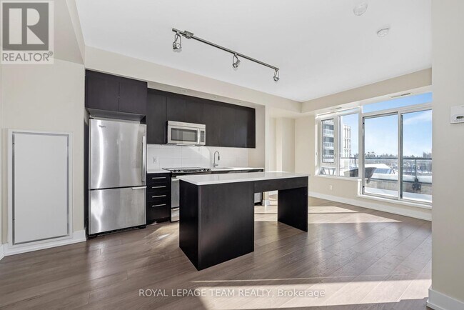 Photo - 360 Patricia Ave Unité 717