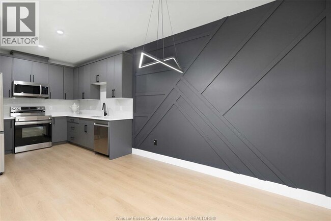 Photo - 705 Grand Marais Rd E Unité 107