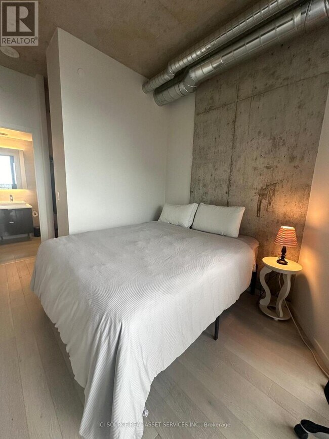 Photo - 21 Lawren Harris Square Unit 912