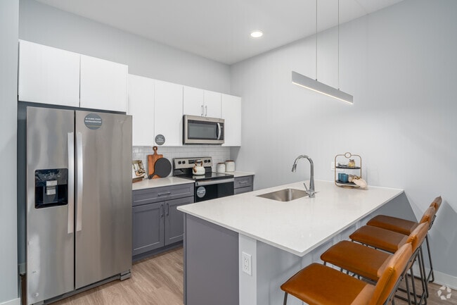 A7 Floor Plan 1BR, 1BA w/ Den - 915SF - Kitchen - The Residences at Payton Place