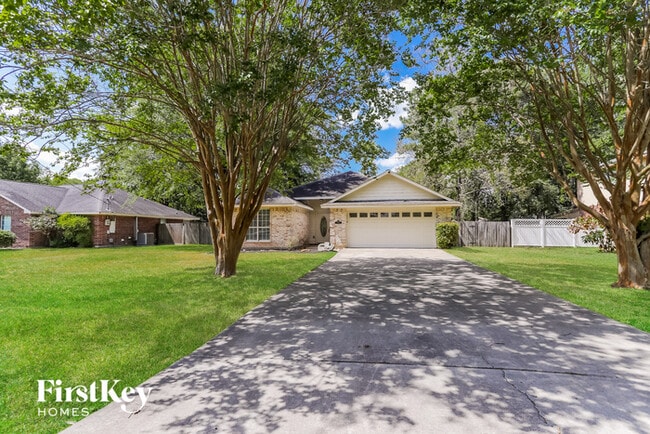 Building Photo - 7122 Woodland Oaks Rental