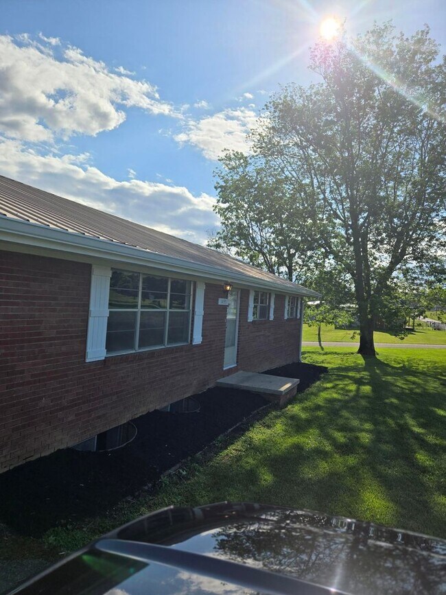 Photo - Charming 3-Bedroom Brick Home in Town – Ne...