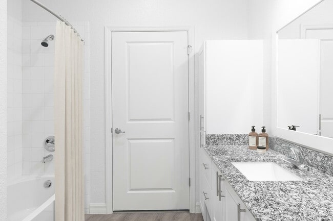 Experience luxury with this stylish bathroom featuring sleek finishes.