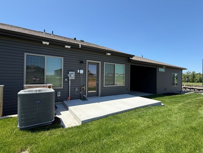 Photo - Ranch townhome with 2 stall garage. Spacious 2 bedrooms with walk in closets, 2.5 bathroom, 1st f...