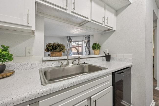 Modern White Kitchen with Ample Cabinet Space