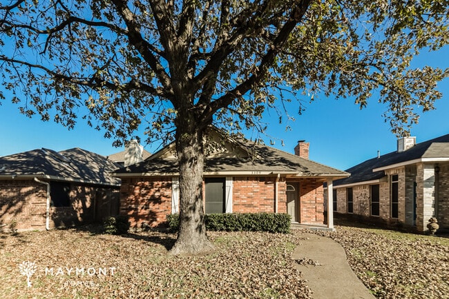 Building Photo - Charming Brick Home in Rowlett, TX