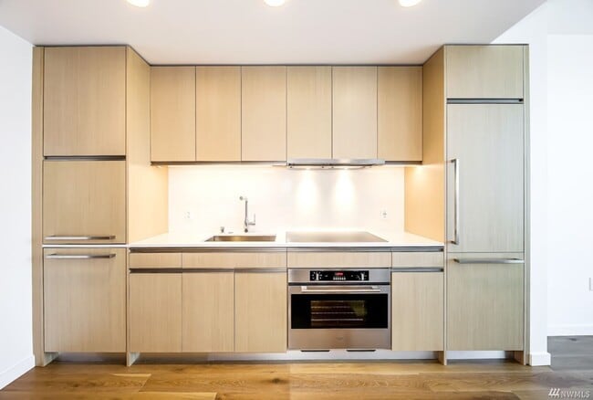 Photo - Spacious NW-Facing 1 Bed + Den, 1 Bath Luxury High-Rise Condo in Seattle's Denny Triangle – Nexus