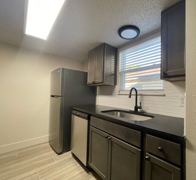 Photo - Location, Location, Location & Beautifully Renovated in 2023 2 Bedroom, 1.5 Bath, 1 Car Garage wi...
