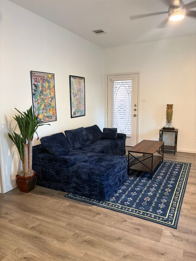 Living room with door to private patio - 4209 Marathon Blvd Unit 102