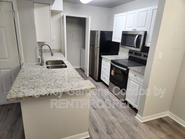 Building Photo - 5530 Chrishire Way Unit 205 Rental