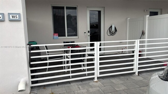 Building Photo - 6455 NW 103rd Pl Unit 105