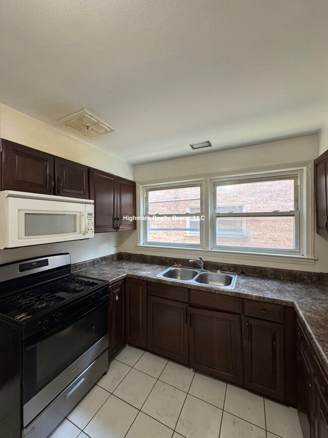 Building Photo - 8242 Kilpatrick Ave Unit 1B