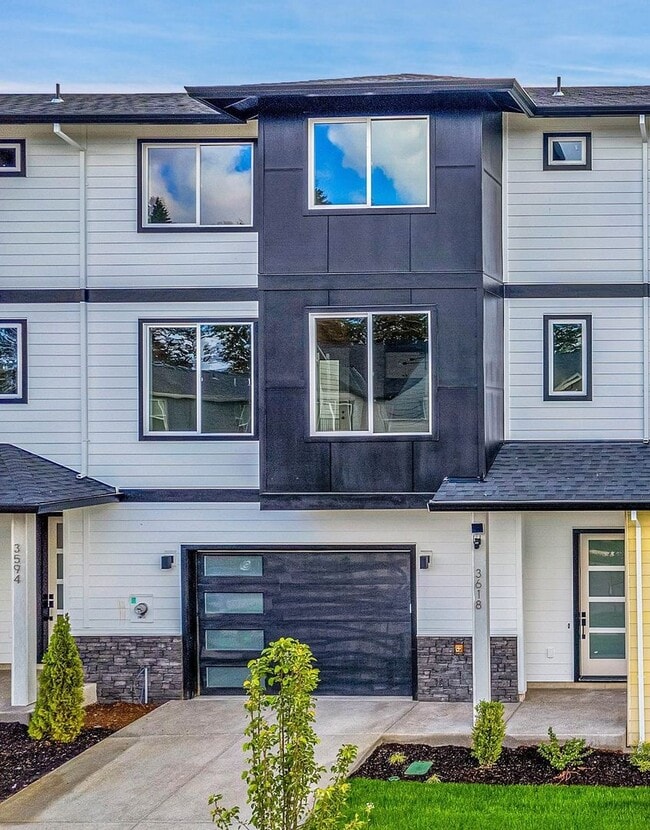 Building Photo - Brand New Modern Open-Concept Condo with Kitchen Island, Granite Counters and a Deck