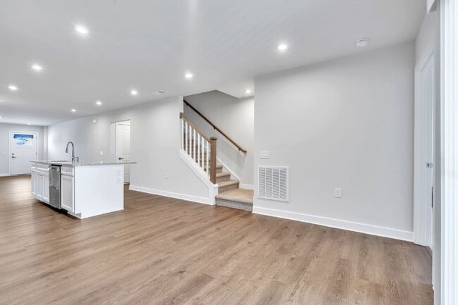 Photo - Modern Comfort: 3 Bed, 2.5 Bath Townhome + Primary on Main $2,050/mo rent