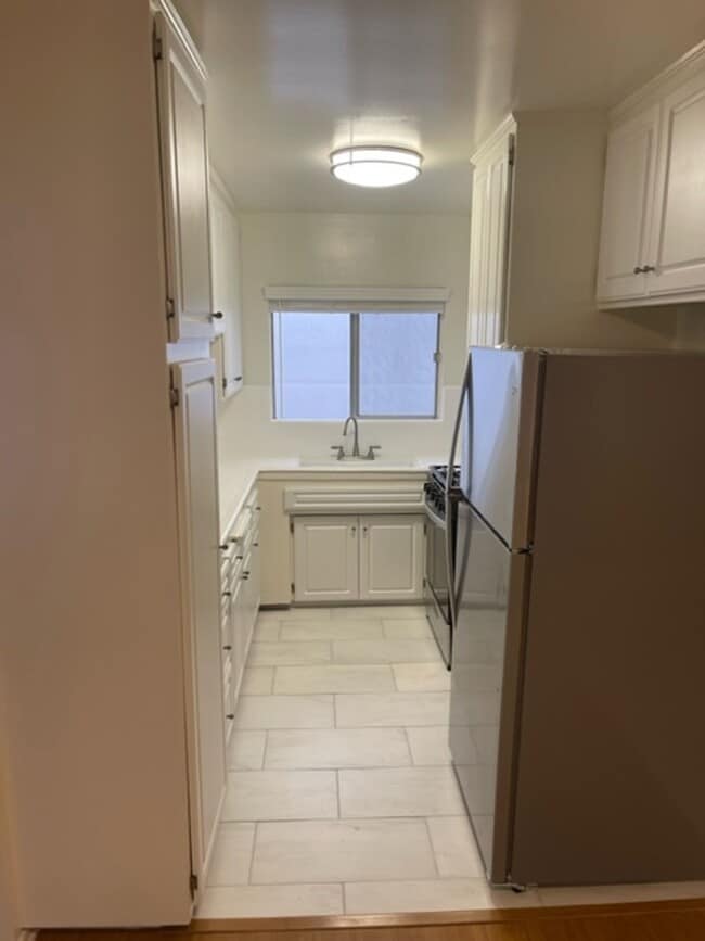 Photo - 119 - 7631 Norton Ave