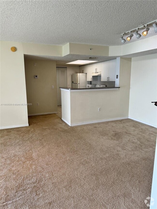 Building Photo - 5055 Wiles Rd Unit 208 Rental