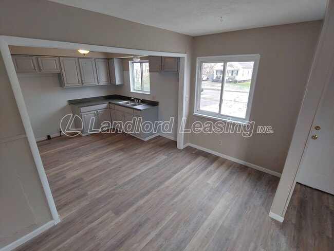 Photo - Freshly painted 3 bedroom with new flooring throughout!