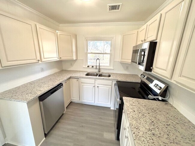 Photo - Coming Soon-2/5/26!- Charming 3- bedroom home with a move in special!