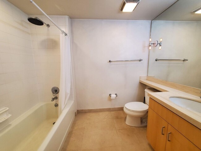 Photo - Downtown High-Rise Studio with parking and in-home laundry