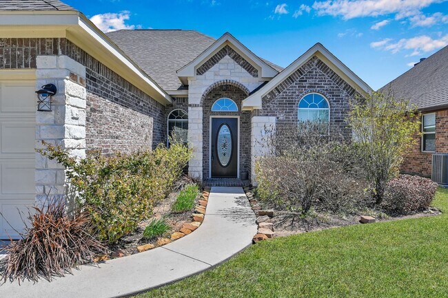 Photo - One story, and a 3-car garage!