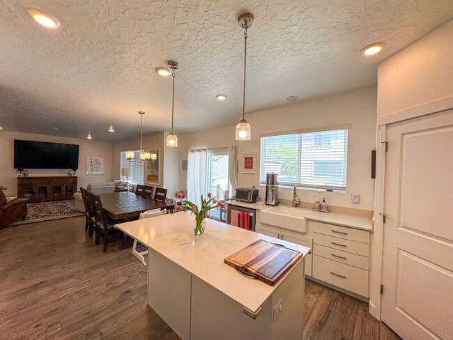 Photo - Beautiful 4 Bed 3.5 Bath Home in Syracuse + Bonus Room + Fenced Yard + 86” TV Included