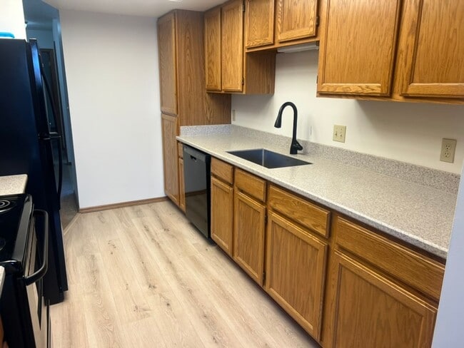 Photo - Beautiful & Spacious 2 Bed / 2 Bath Condo Near MSU – Top-Floor with Garage!