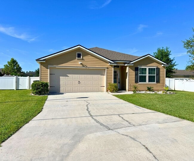 Photo - Stylish 4-Bedroom Home with Fenced Yard – Prime Location!