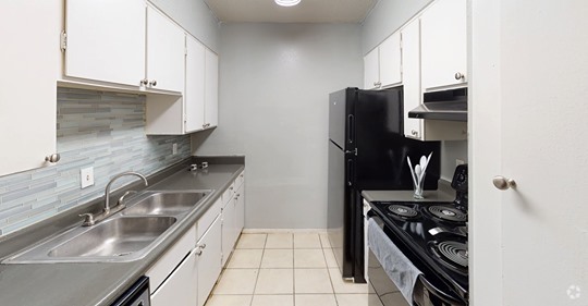 Kitchen with new backsplash - The New Horizon Rental