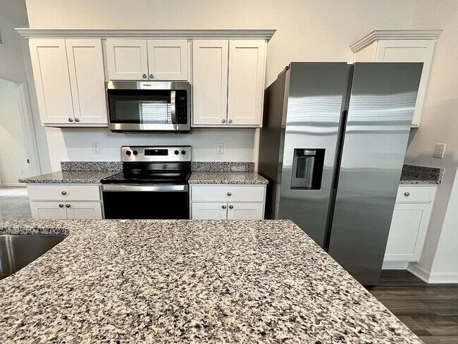 Photo - "Charming 3-Bed, 2-Bath Oasis in Zephyrhills – Your Perfect Retreat Awaits!"